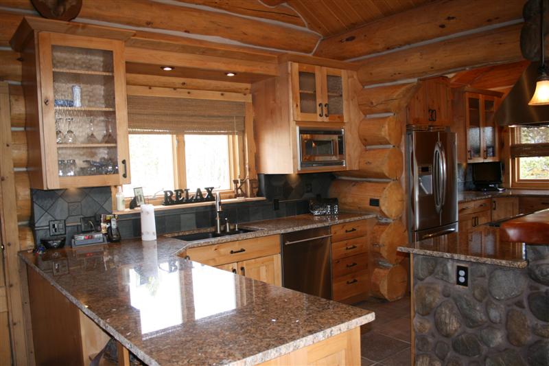 Beautiful log cabin kitchen design in Colorado  JM 