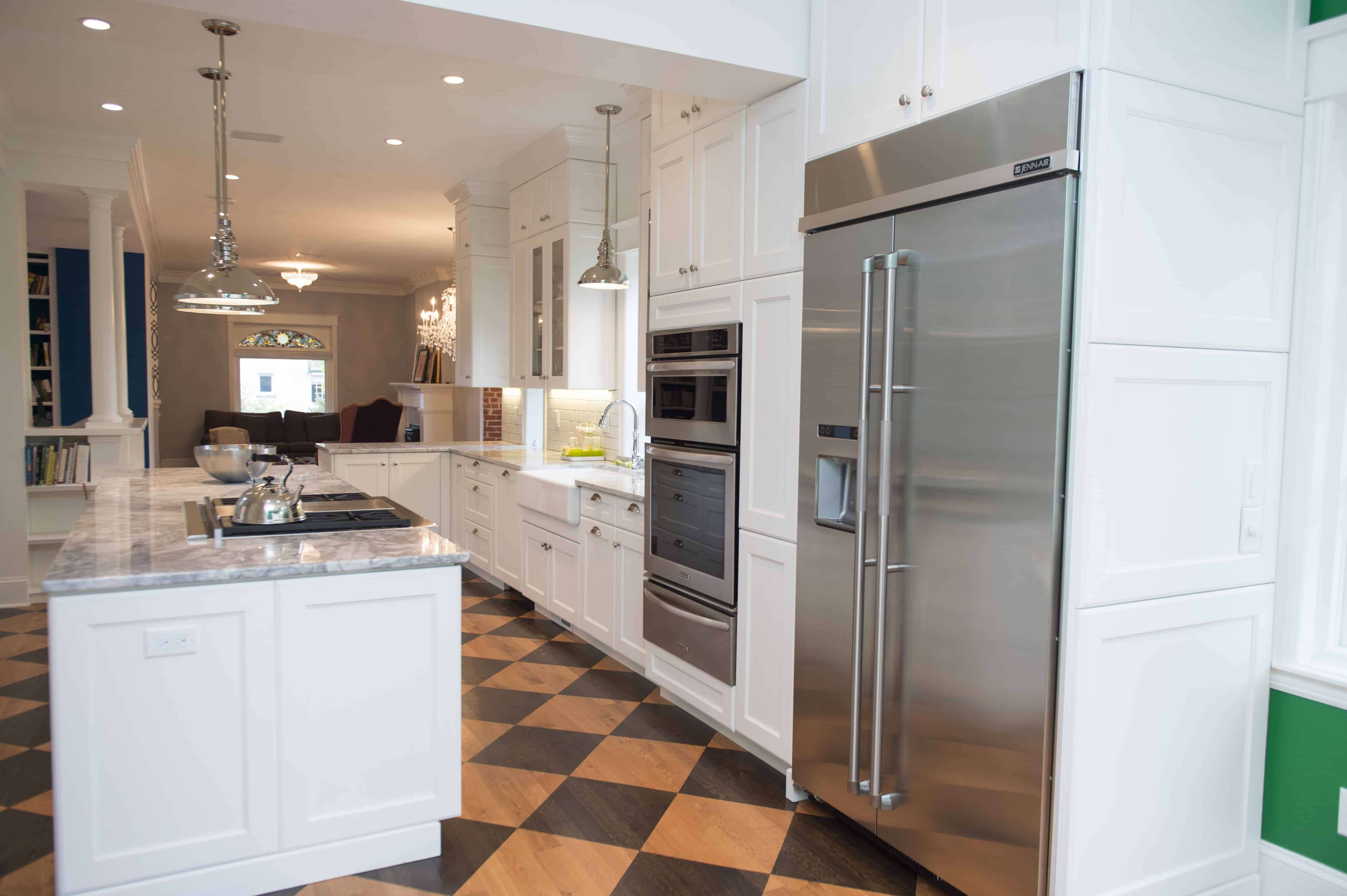 White shaker cabinet kitchen with stainless steel appliances