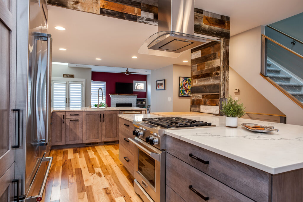 stainless steel Range hood in this Denver Contemporary Kitchen Remodel by Juli