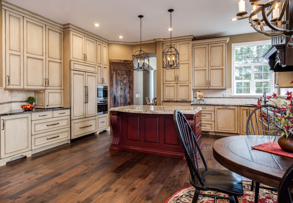 Expansive Distressed Painted Cabinet Kitchen Remodel with Wood Island