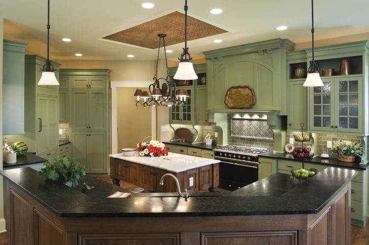 green kitchen Cabinets Country style gourmet kitchen in a residential home with painted custom cabinets, marble topped center island, soapstone counter tops and tin ceiling inlay.