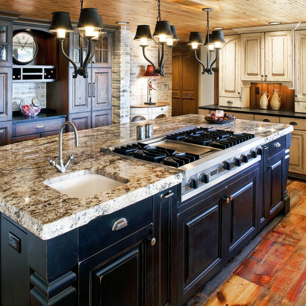 Colorado Rustic Design with black and white distressed painted wood, center island stove and sink.
